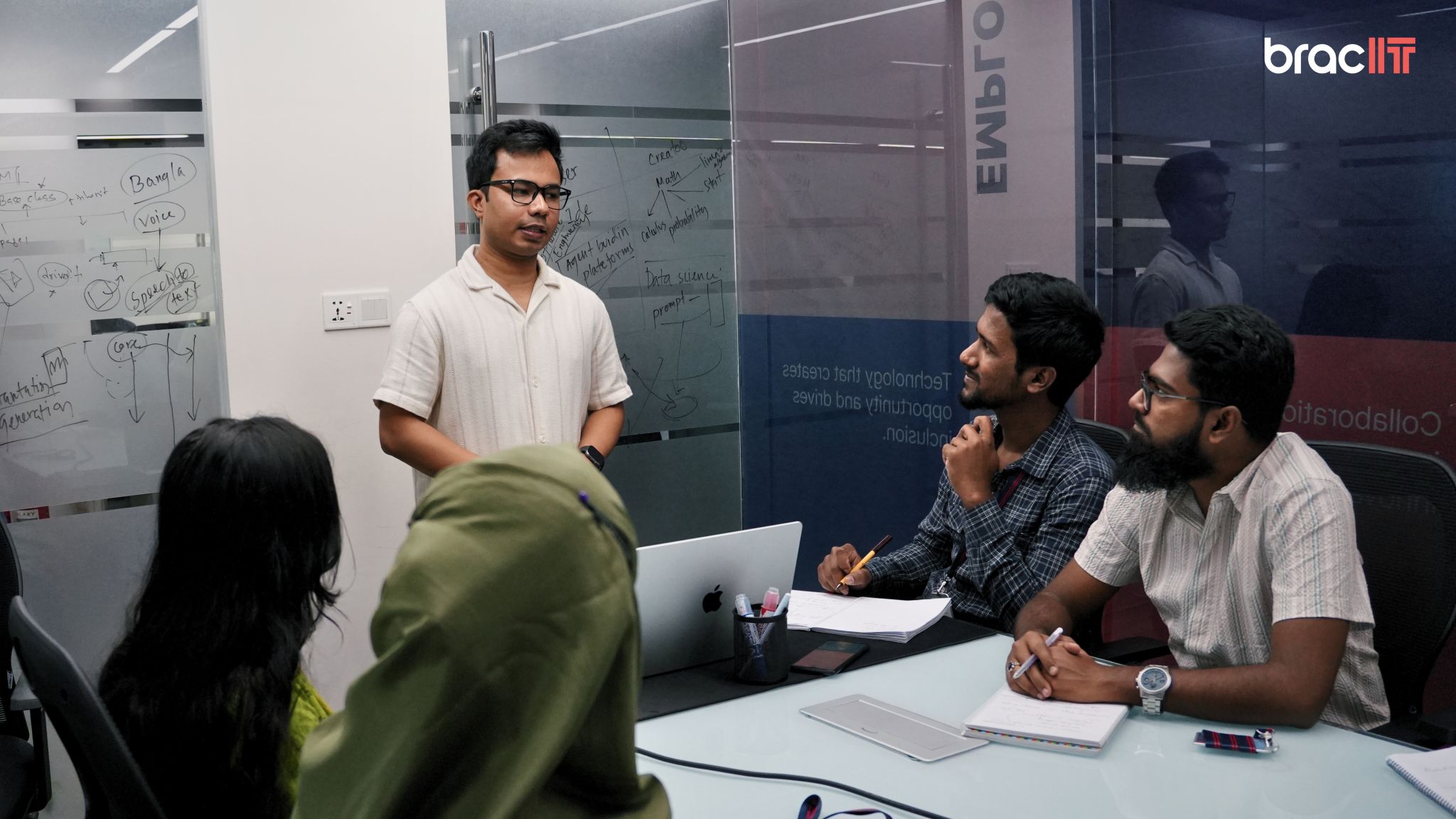 Conducting a training session at BRAC IT